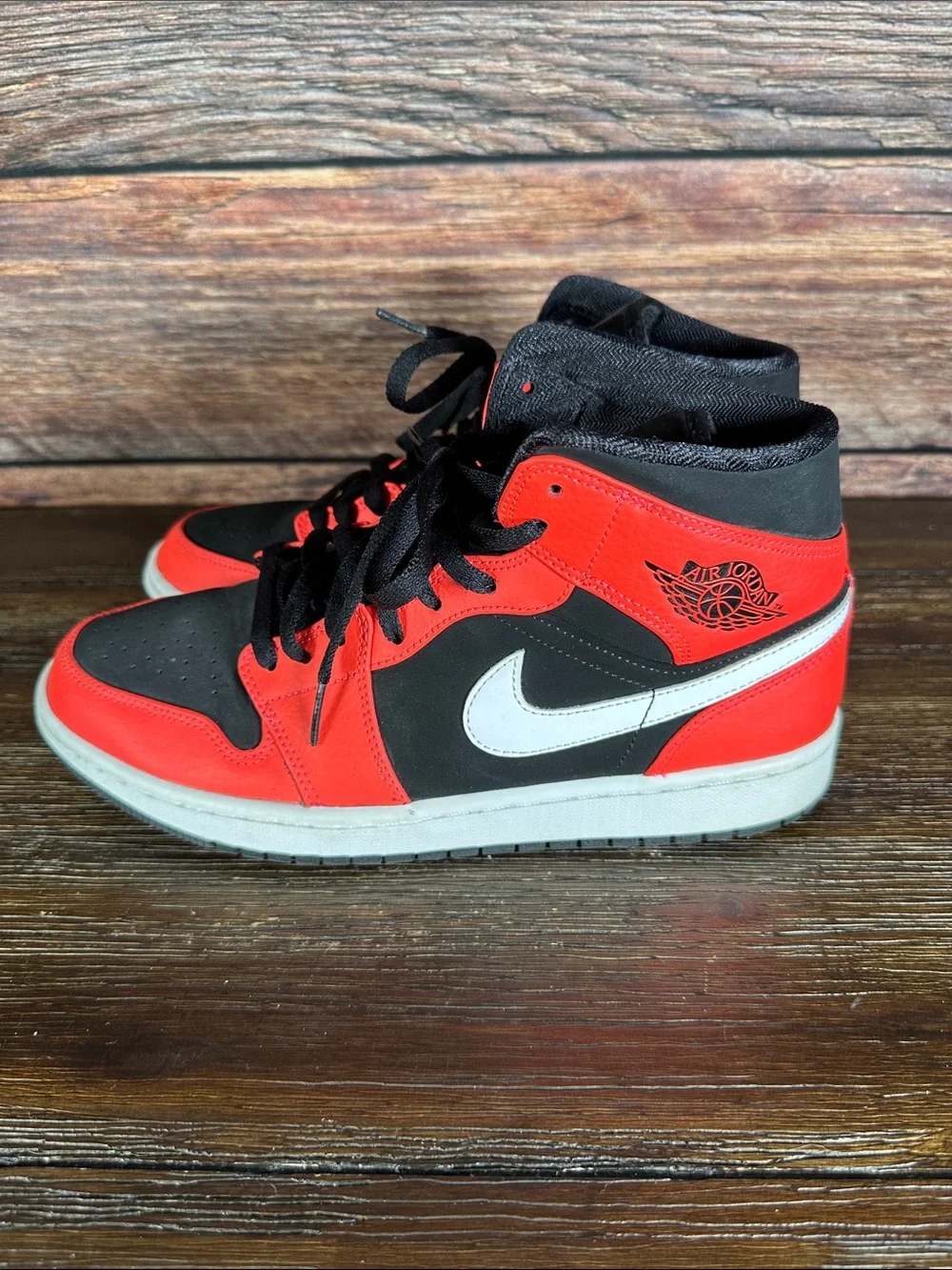 Nike Air Jordan 1 Mid Infrared 23 sneakers in Black and Neon Red